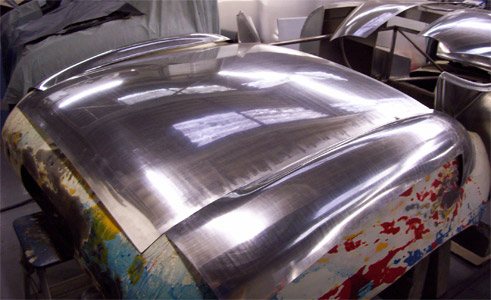Elva Mk3 tail section under construction showing the various panels being matched to the original body
